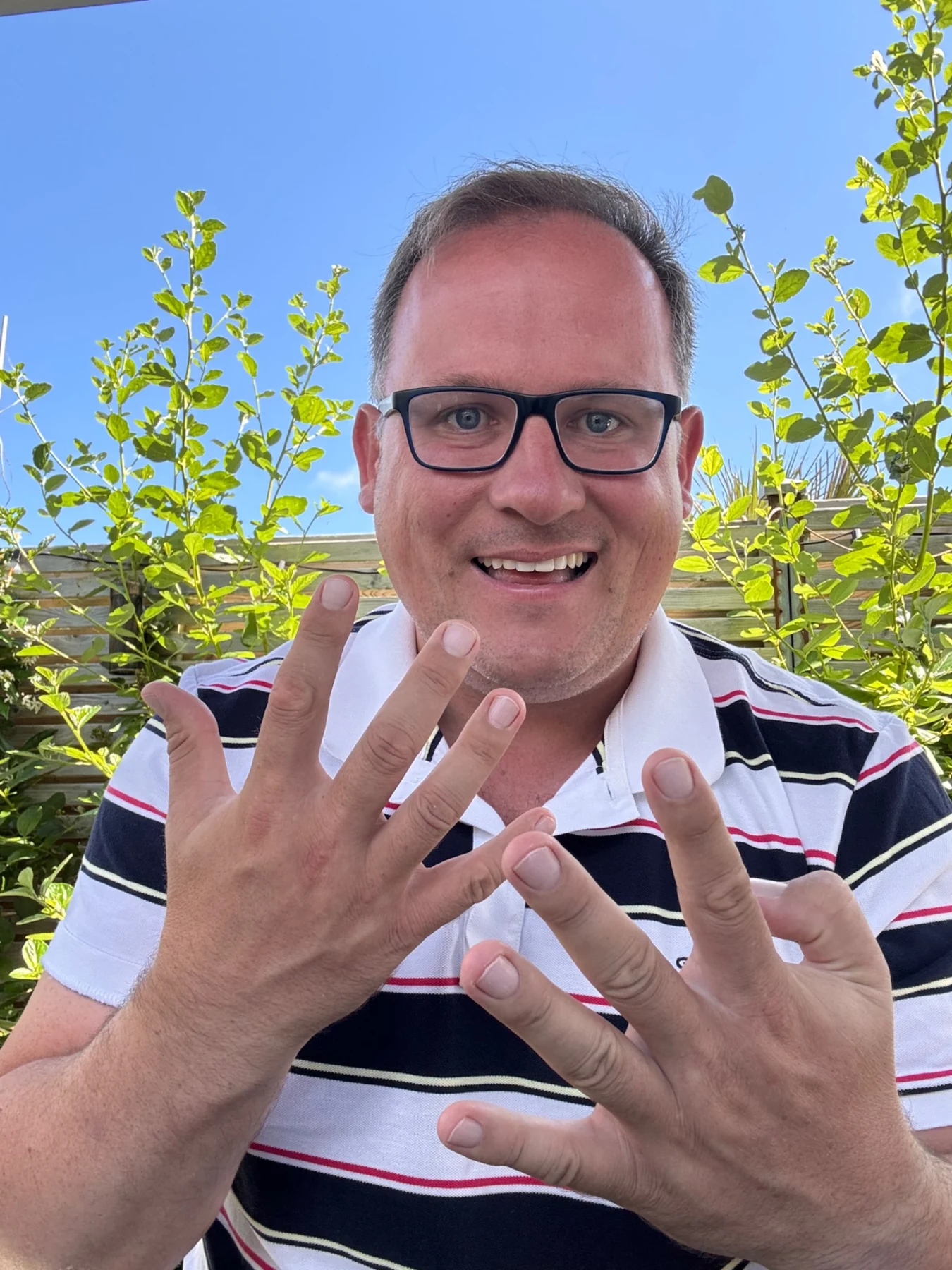 Dominic Murphy holding up nine fingers